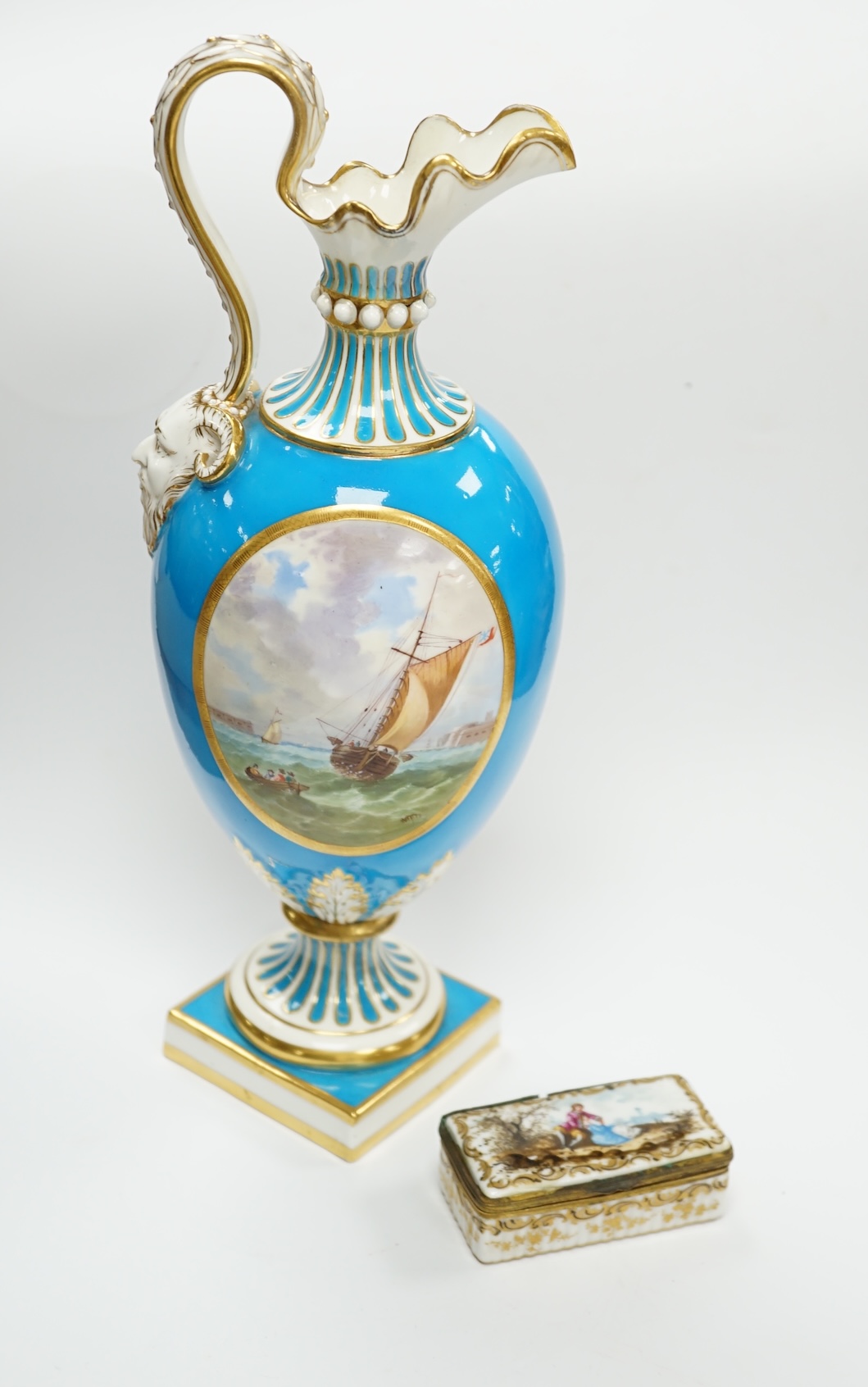 A 19th century Minton turquoise ground ewer, and a Continental porcelain snuff box and cover, ewer 29cm high